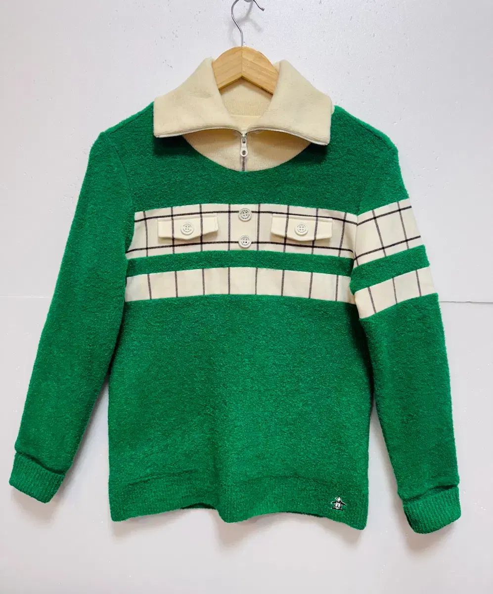 マンシングウェア 防風ニット グリーン