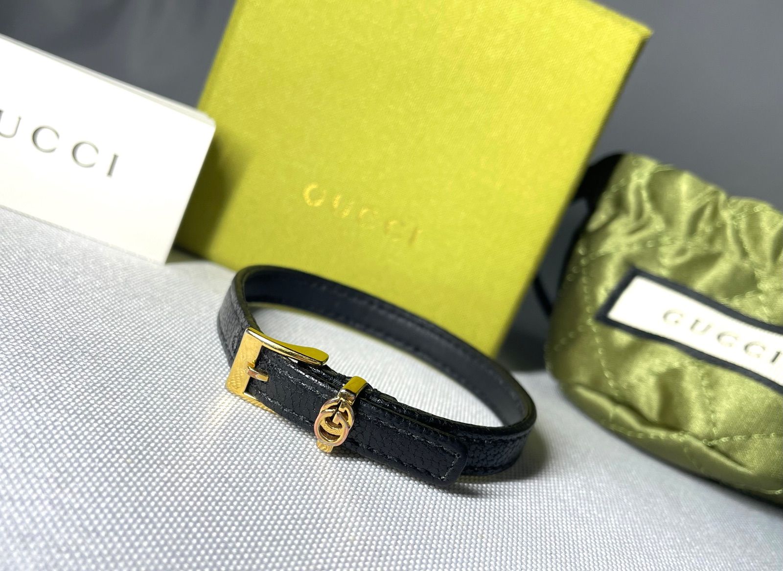 GUCCI グッチ インターロッキングG 金具 レザーブレスレット 黒 - 金 ブラック ゴールド 17 18 cm 男女兼用 付属あり