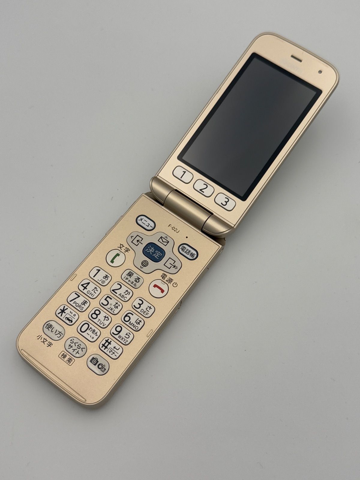 docomo 富士通 らくらくホン F-02J ゴールド ガラホ SIMロック解除済み