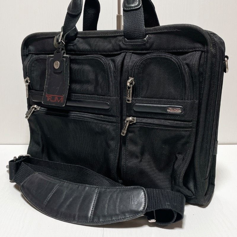 状態良 TUMI ブラック ビジネスバッグ A4 宿泊　ショルダー調整 2way/A4】TUMI トゥミ ビジネスバッグ ブリーフケース ショルダー