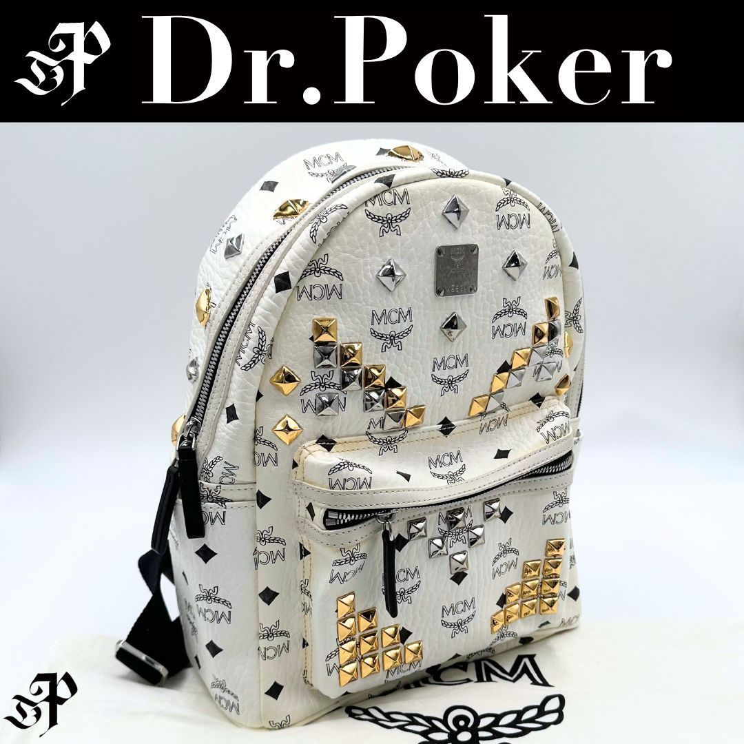 美品】MCM 総柄ロゴ スタッズ リュック バックパック - メルカリ