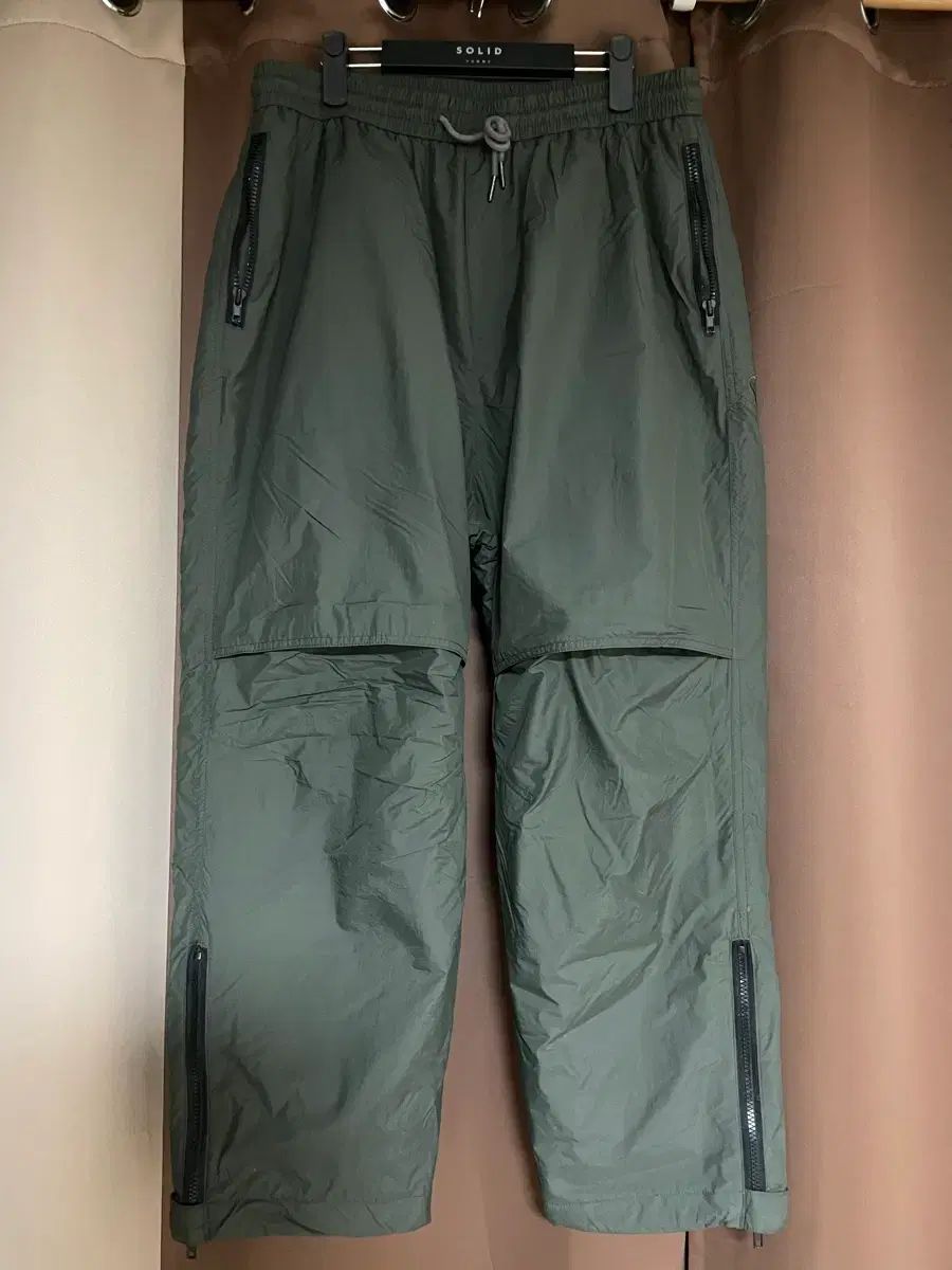 50 ジュンジ プリマロフト ルーズ トレーナー パンツ カーキ