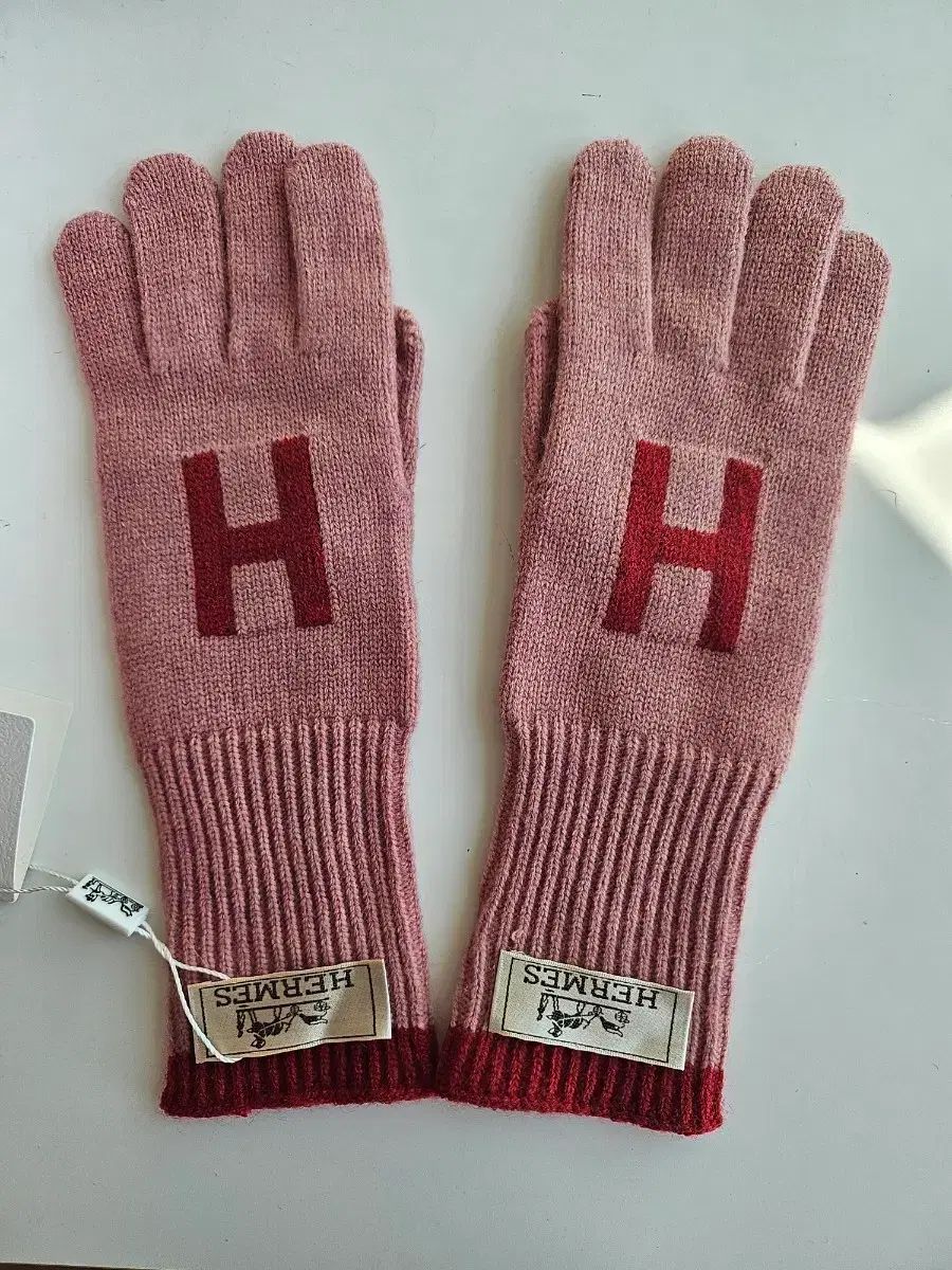 エルH ロゴ ピンク ニット ロークルー手袋
