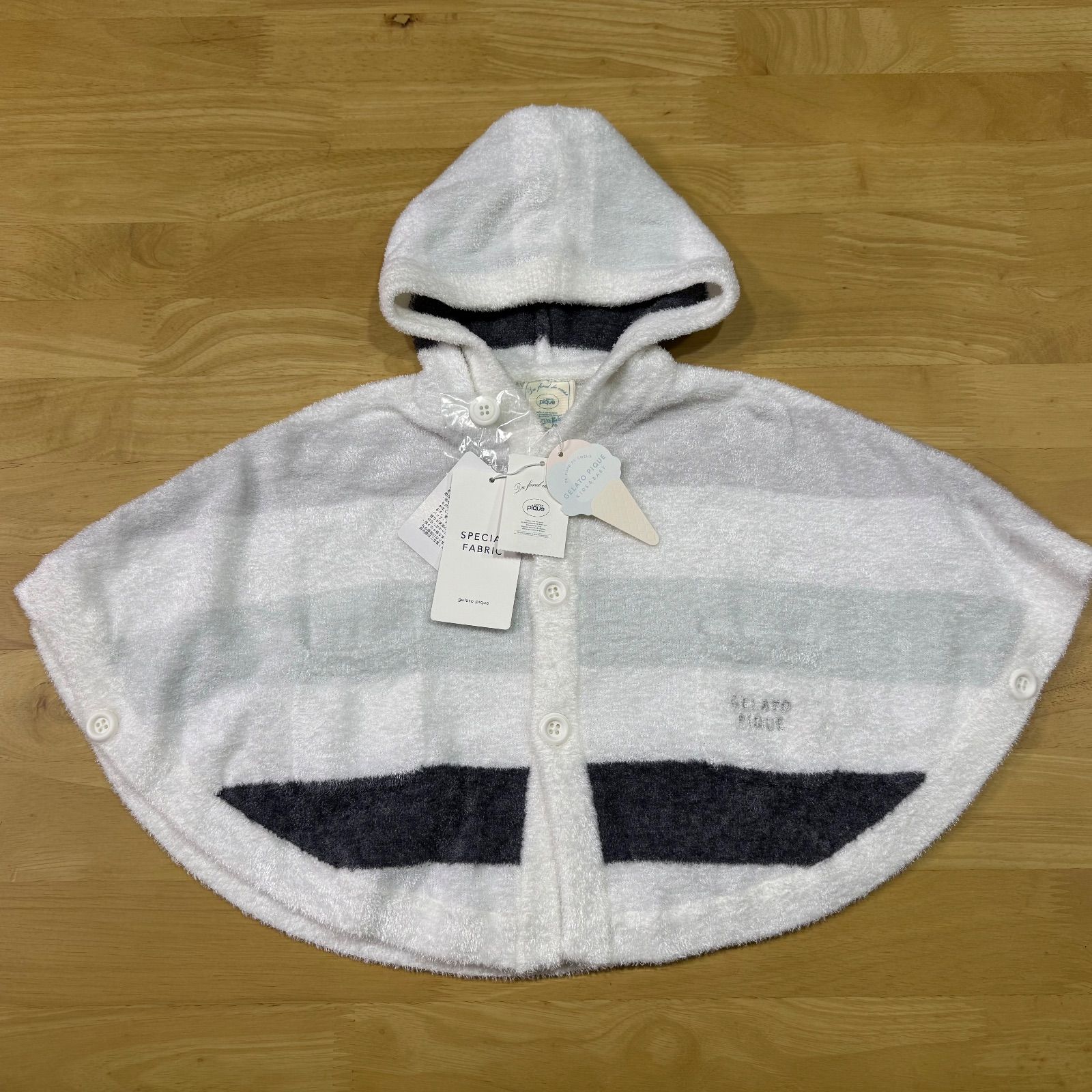 新品タグ付き◎ジェラートピケポンチョ - メルカリ