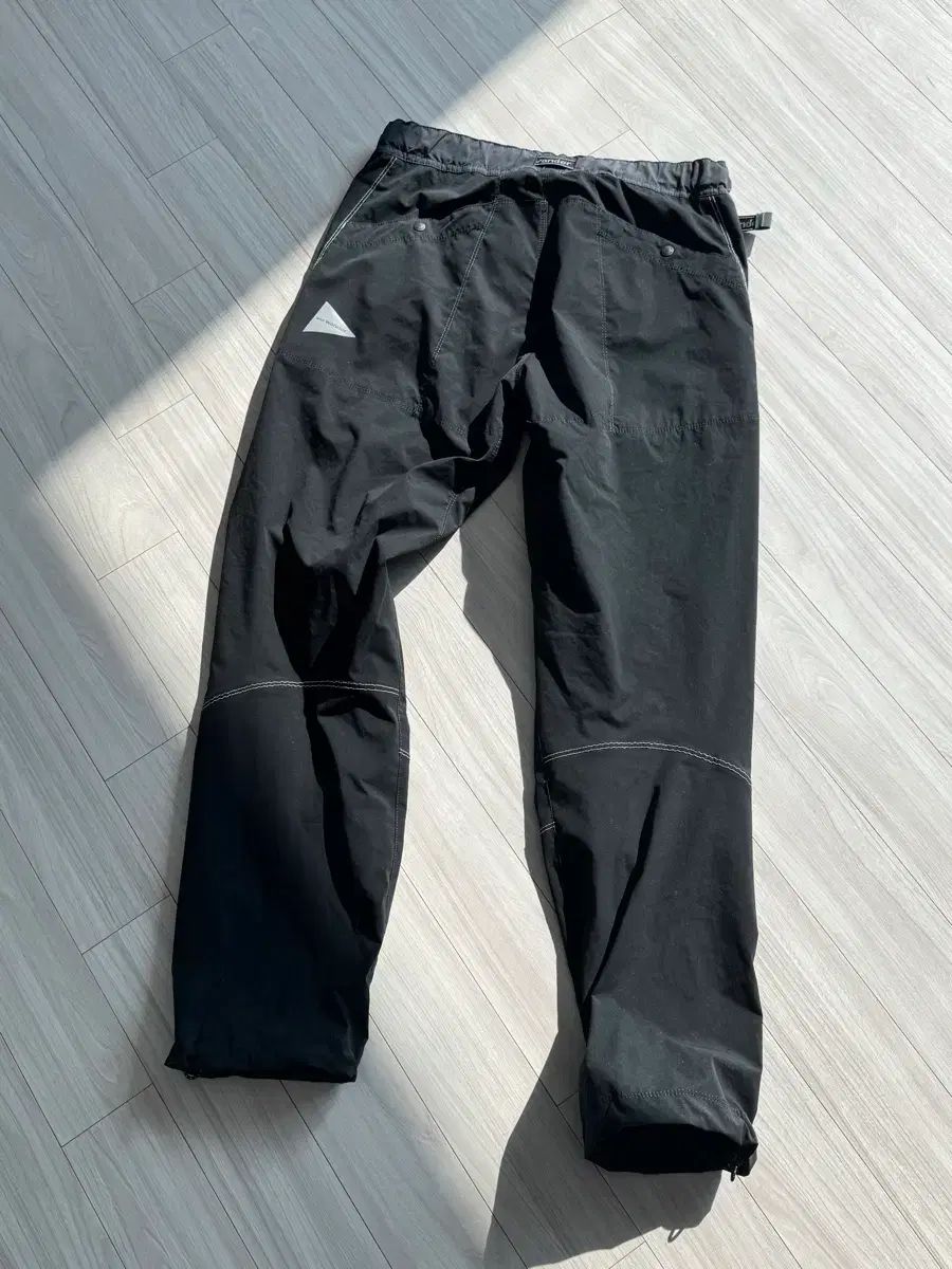 and wander アンドワンダー トレッキングパンツ ブラック