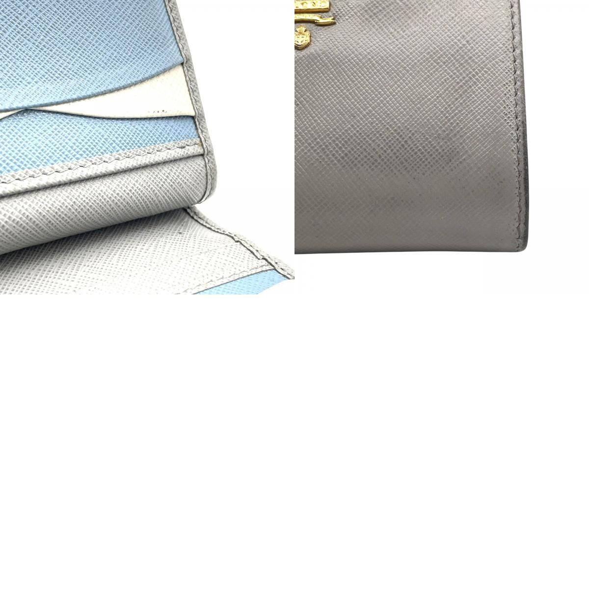 極美品】 プラダ 折り財布 ロゴ シルバー金具 サフィアーノ レザー