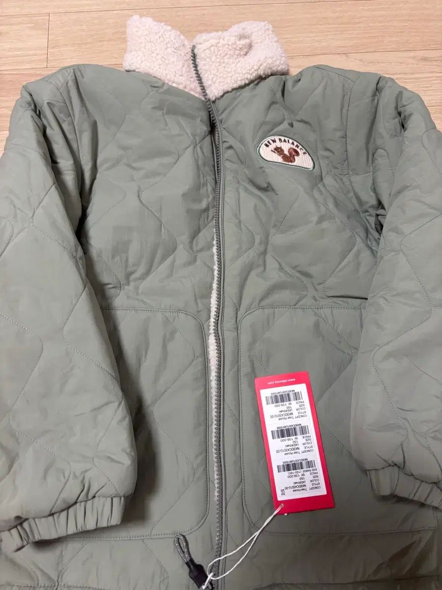 ニュー ンスリバーシブルアウター カーキ 150