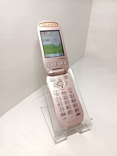 富士通 携帯電話 docomo F 07 A らくらくホンベーシックII ロゼ 白ロム