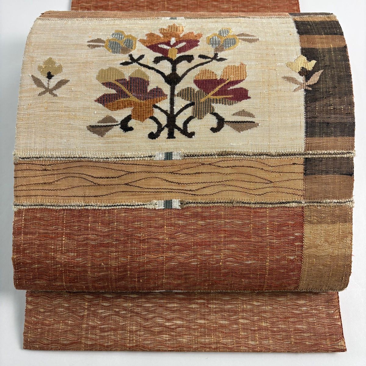 袋帯 秀品 草花 幾何学模様 金糸 赤茶 お太鼓柄 正絹