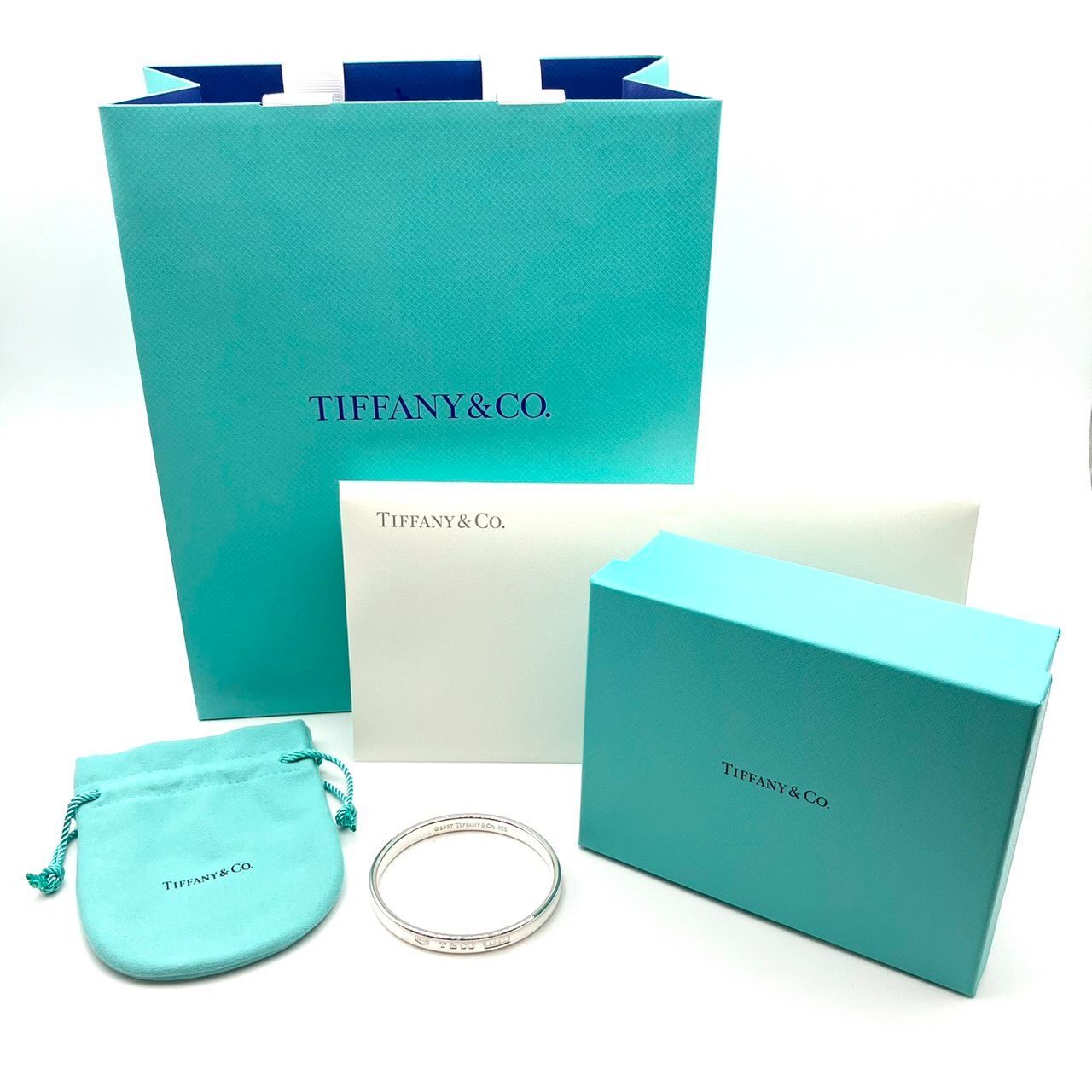 z|z|z|X 124-10| メーカーメンテナンス済 TIFFANY-Co.ティファニー ナローバングル 1837 925 重量 30.9ｇ 箱 ショッパー 納品書付き