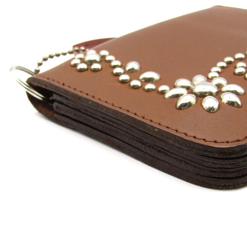 HTC エイチティーシー 二つ折り財布 フラワースタッズ ミディアム