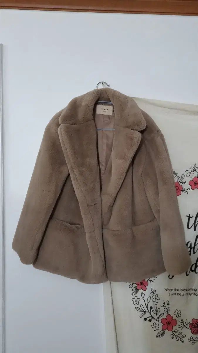 NINE atelier ルーズフィット フェイクファー コート