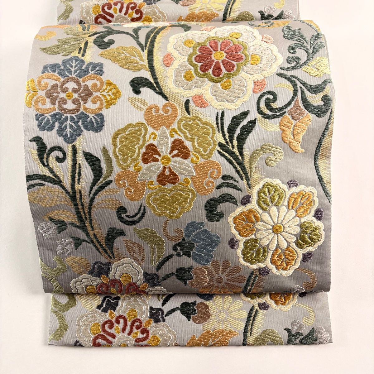 袋帯 名品 花唐草 立涌宝異文 唐織 箔 灰色 六通 正絹