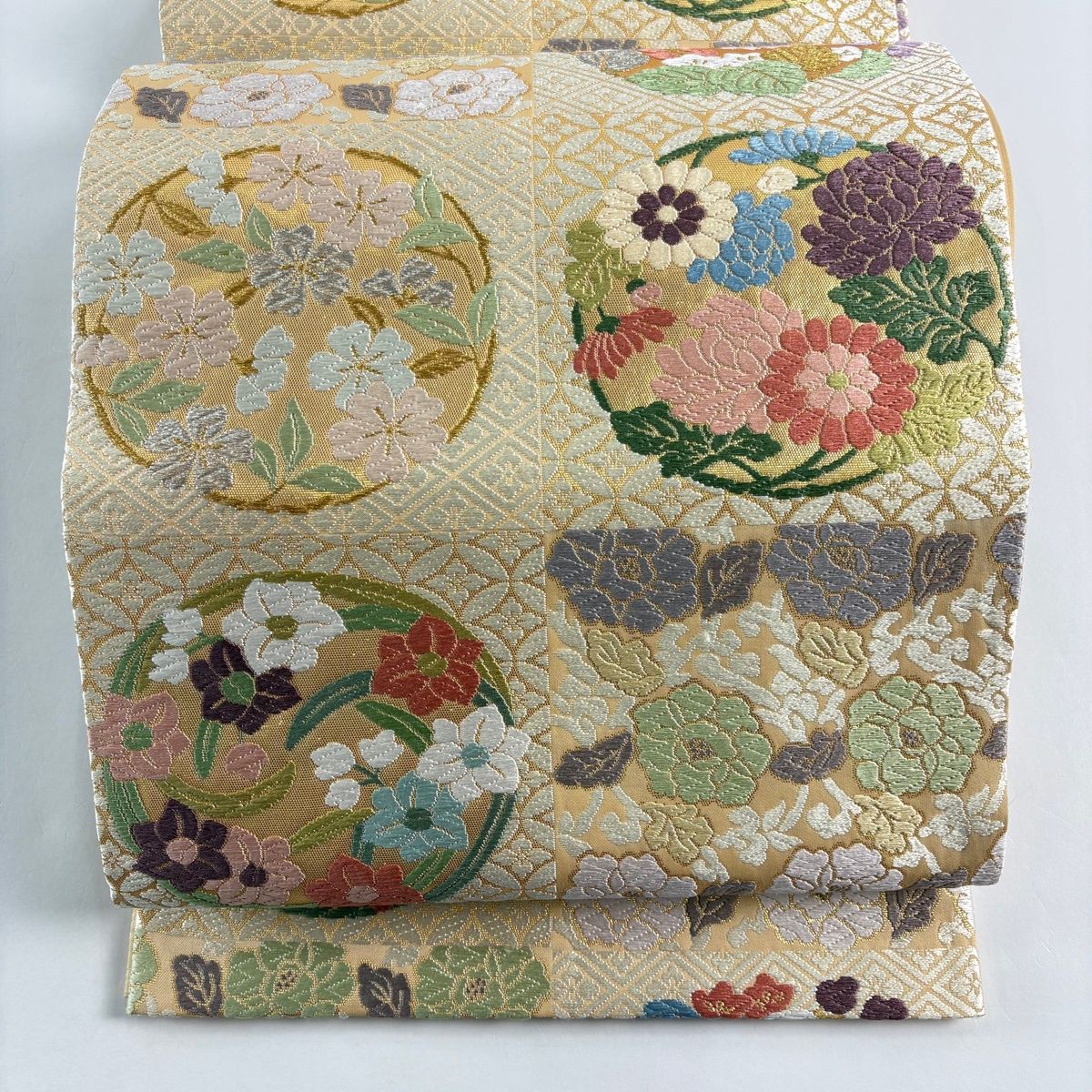 袋帯 秀品 花丸文 七宝 唐織 箔 ベージュ 六通 正絹