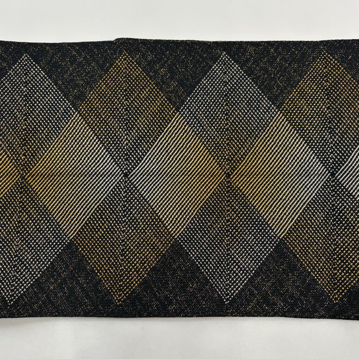 名古屋帯 八寸 めがね織 松葉仕立て 全通柄 黒 カジュアル 中古 kp2097 美品】 名古屋帯 秀品 八寸名古屋帯 松葉仕立て 菱文 金銀糸 組織 黒