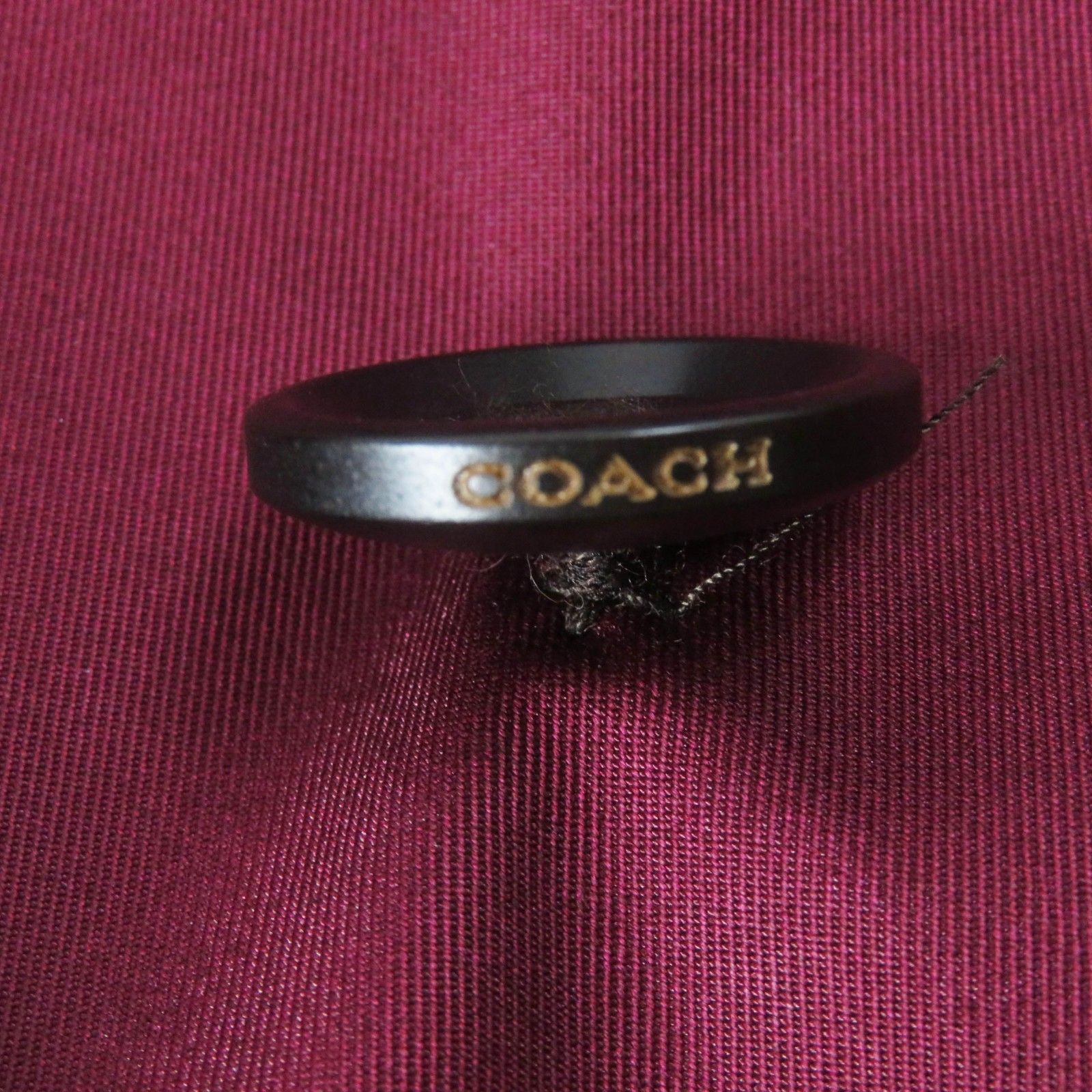 未使用品◎COACH コーチ F34025 裏シグネチャー柄 チャーム・ロゴ