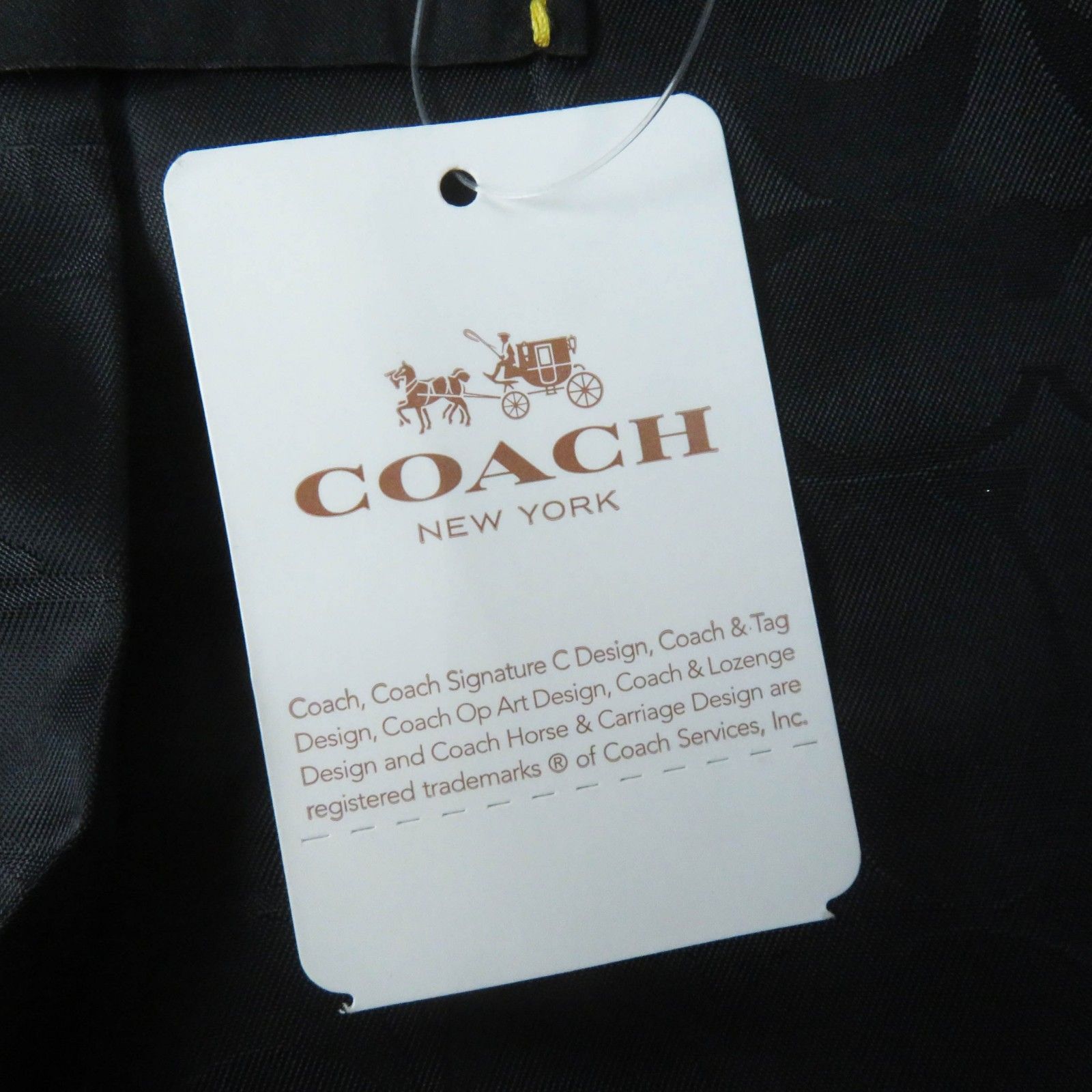 未使用品◎COACH コーチ F34025 裏シグネチャー柄 チャーム・ロゴ