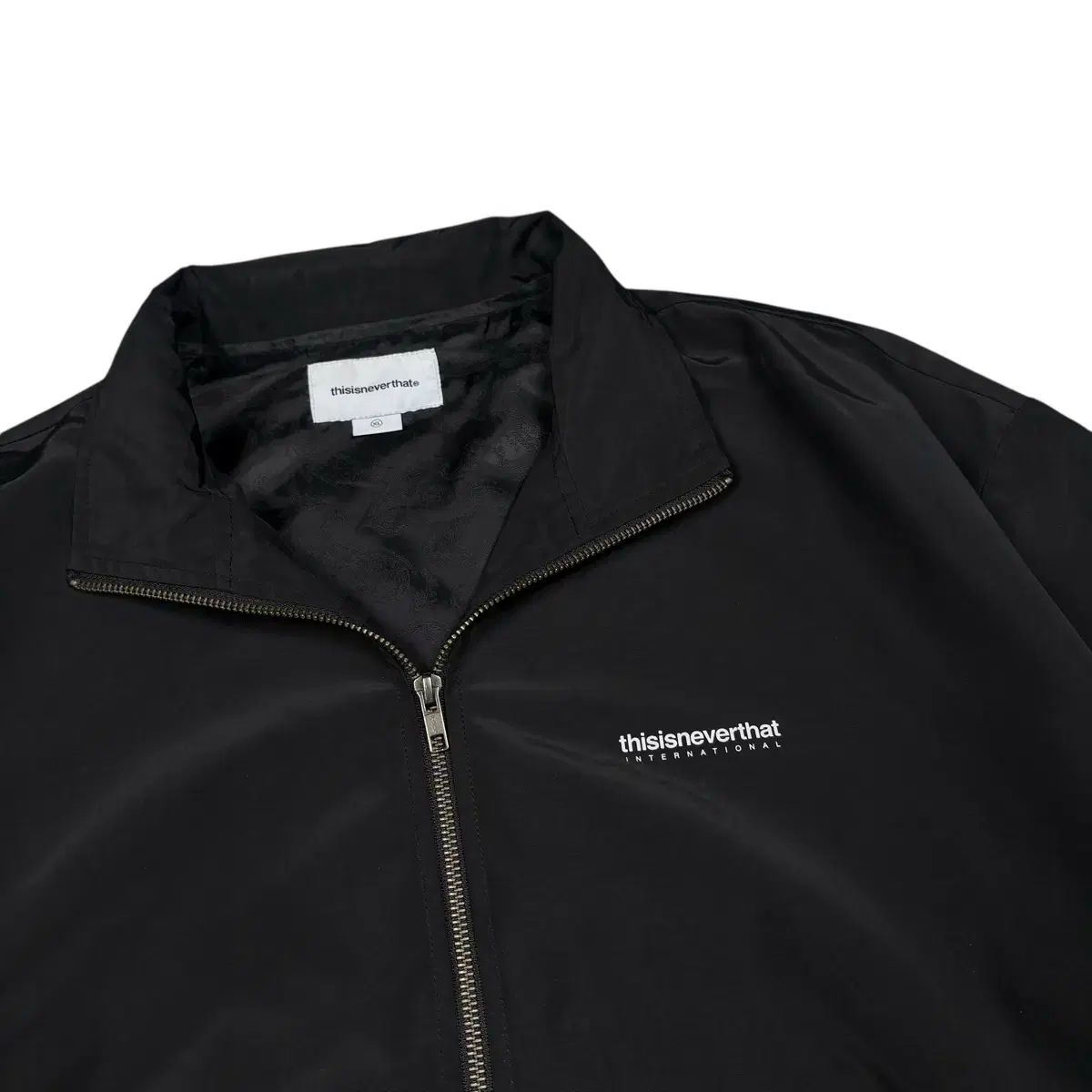 thisisneverthat 黒ナイロンジャケット - メルカリ