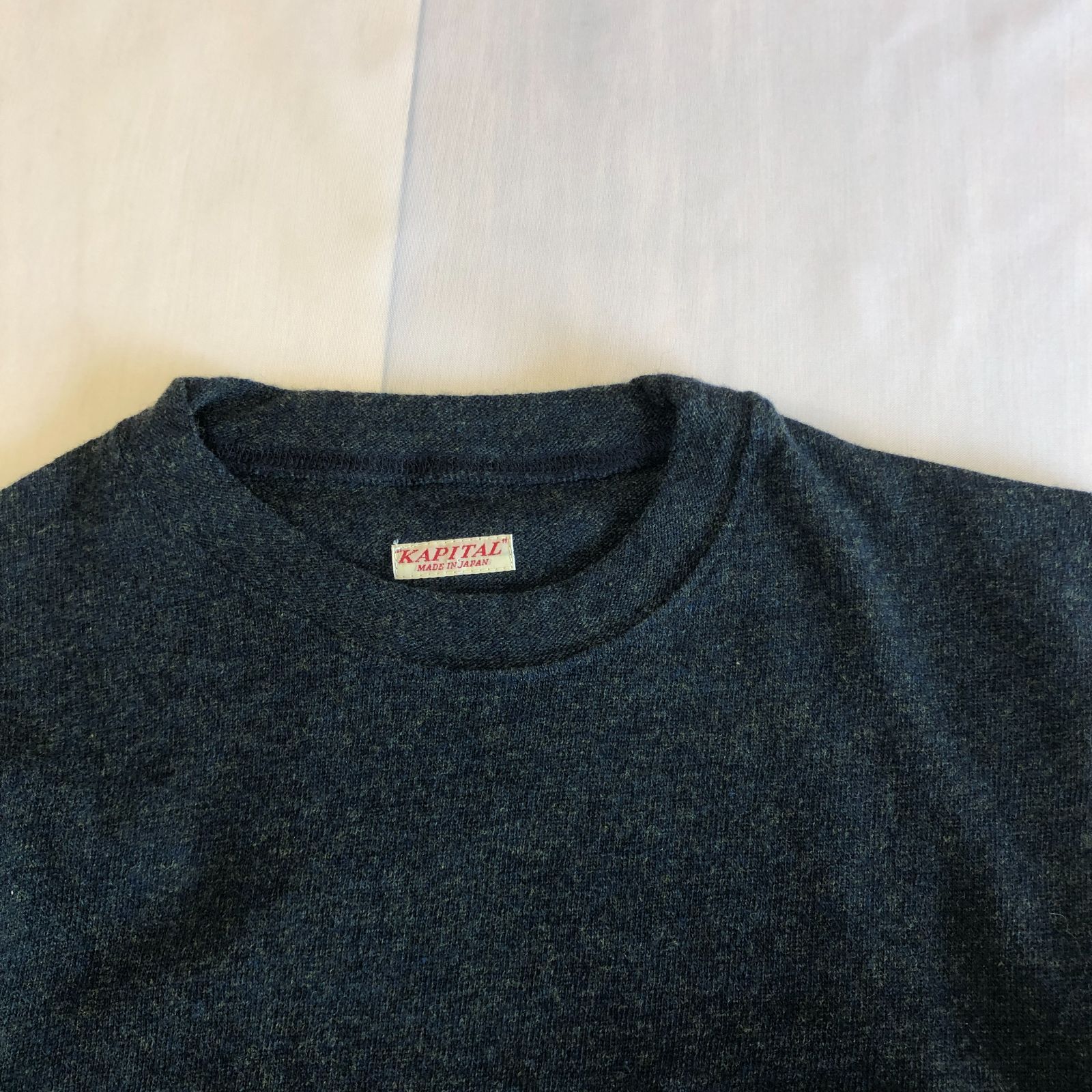 KAPITAL ウール100％ クルーネックニット ロングスリーブ メランジ調ダークブルー 胸ポケット アメカジ ジャストフィット