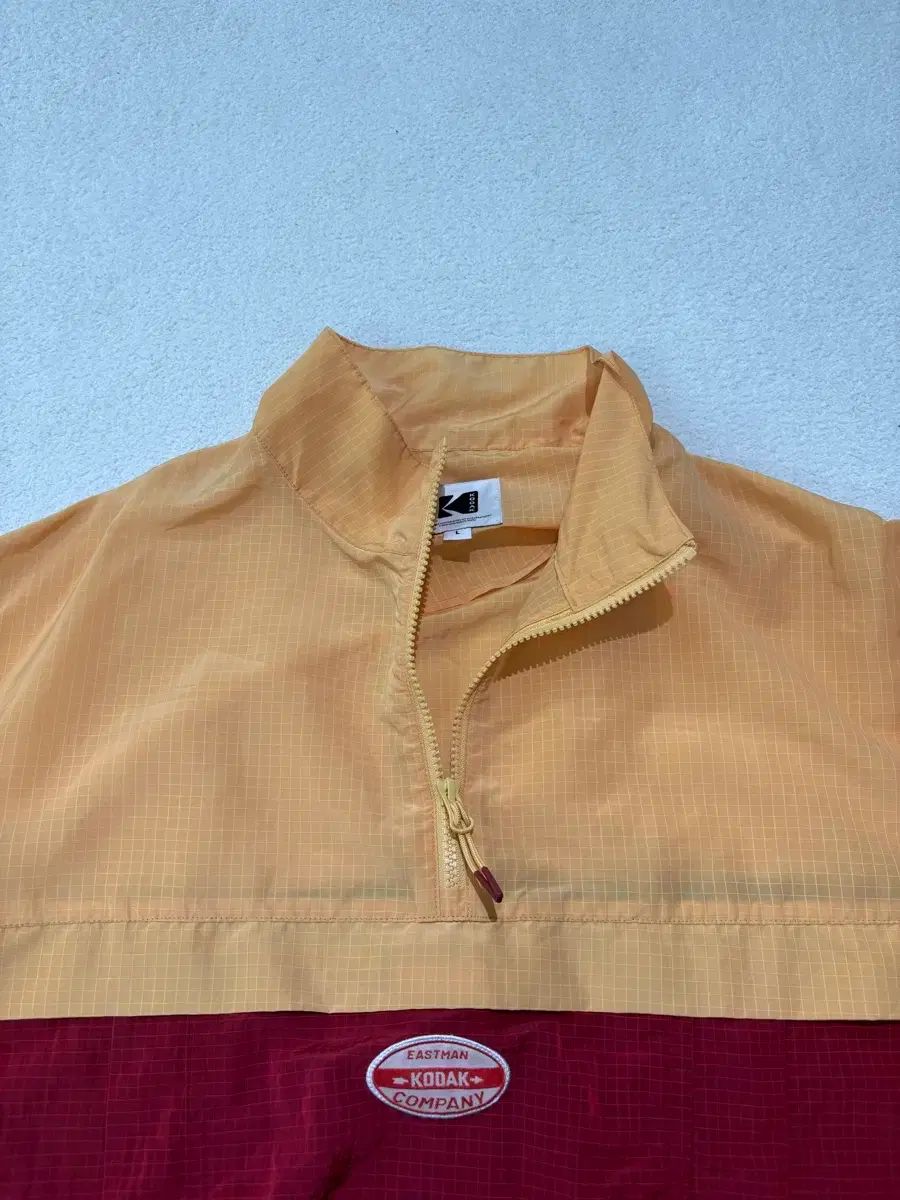 コダック Anorak（アノラック）ウィンドブレーカー オレンジ/レッド