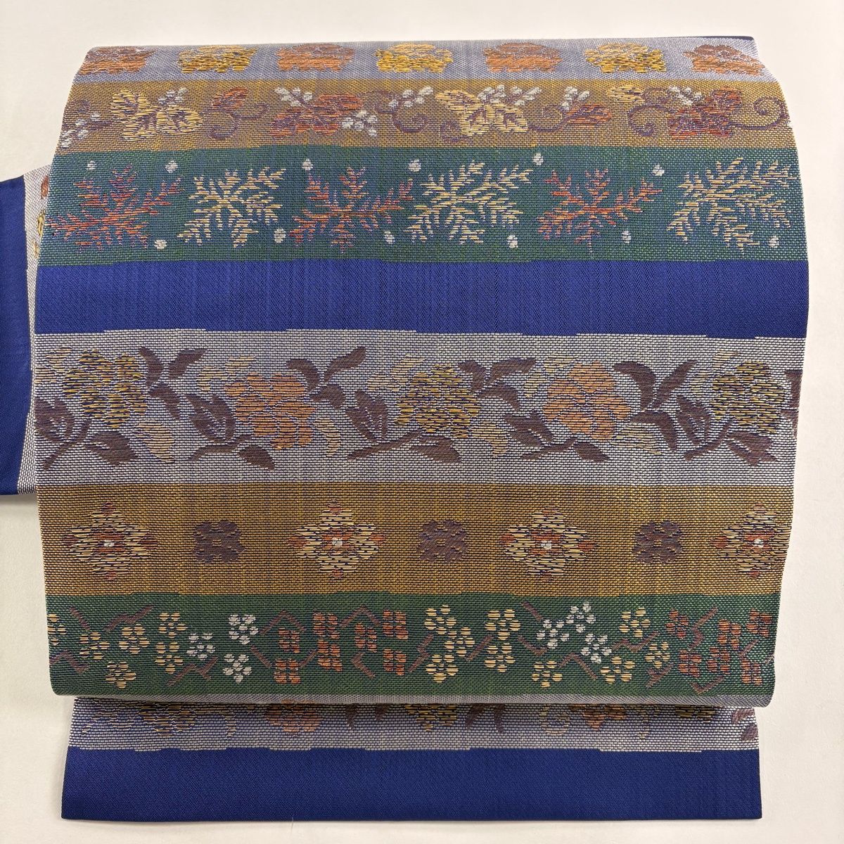 名古屋帯 帯屋捨松 落款 段縞 草花 金糸 箔 青紫 正絹