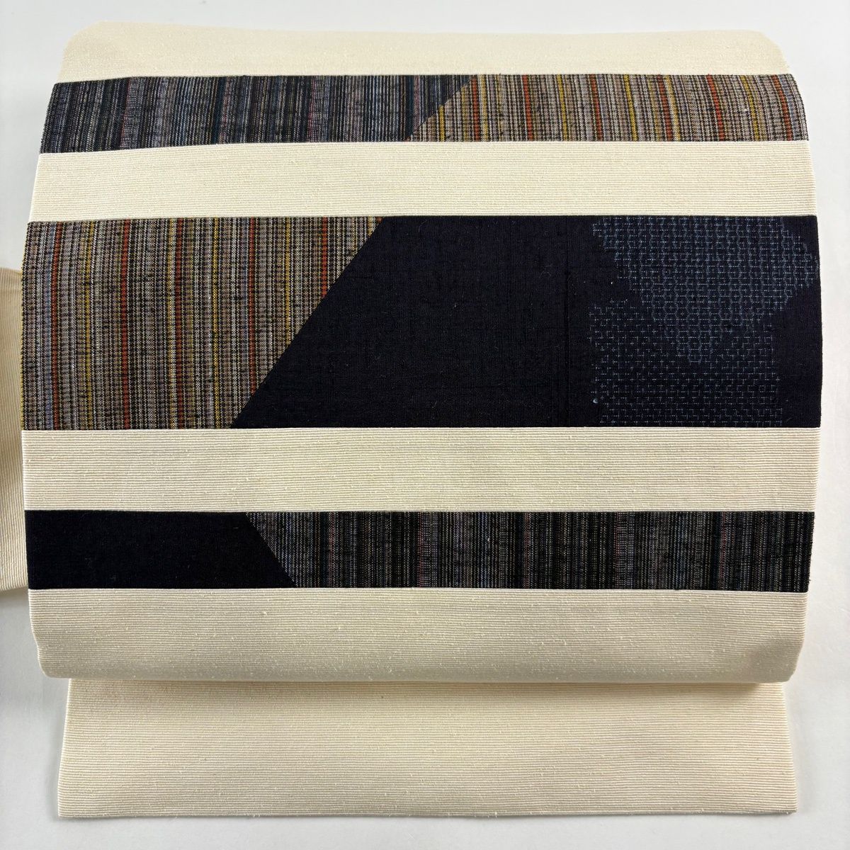 名古屋帯 秀品 縞 亀甲絣 切り嵌め クリーム 正絹