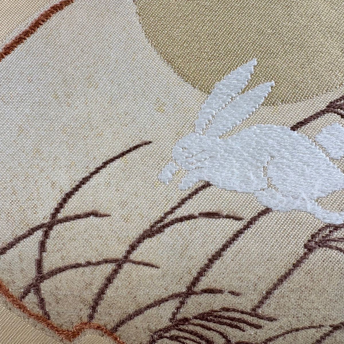 名古屋帯 名品 兎 葉柄 箔 金糸 薄オレンジ 正絹