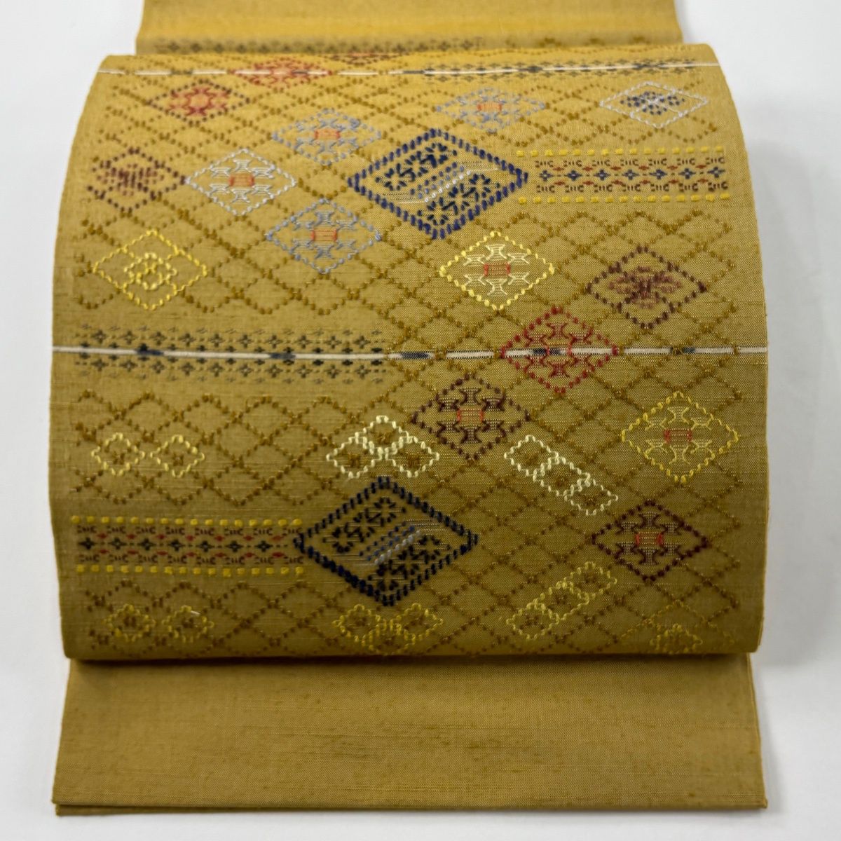 開き名古屋帯 証紙 読谷山花織 菱 幾何学模様 黄土色 正絹
