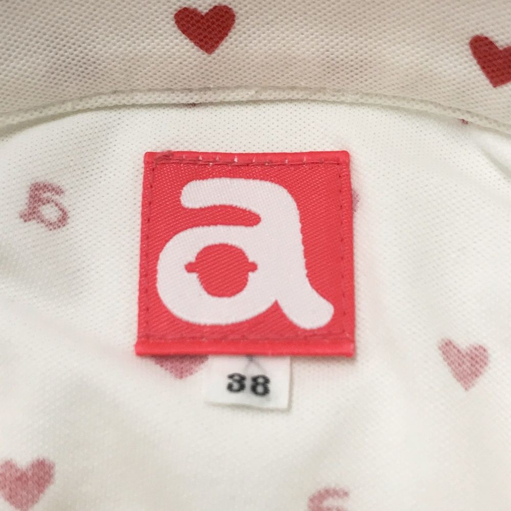 サイズ：38 ARCHIVIO アルチビオ 半袖ポロシャツ ハート ロゴ総柄