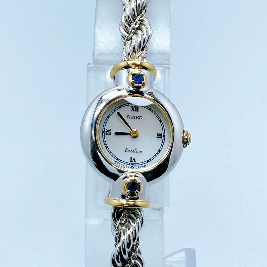599 セイコー 1 E 20-0690 エクセリーヌ シェル ラウンド 腕時計