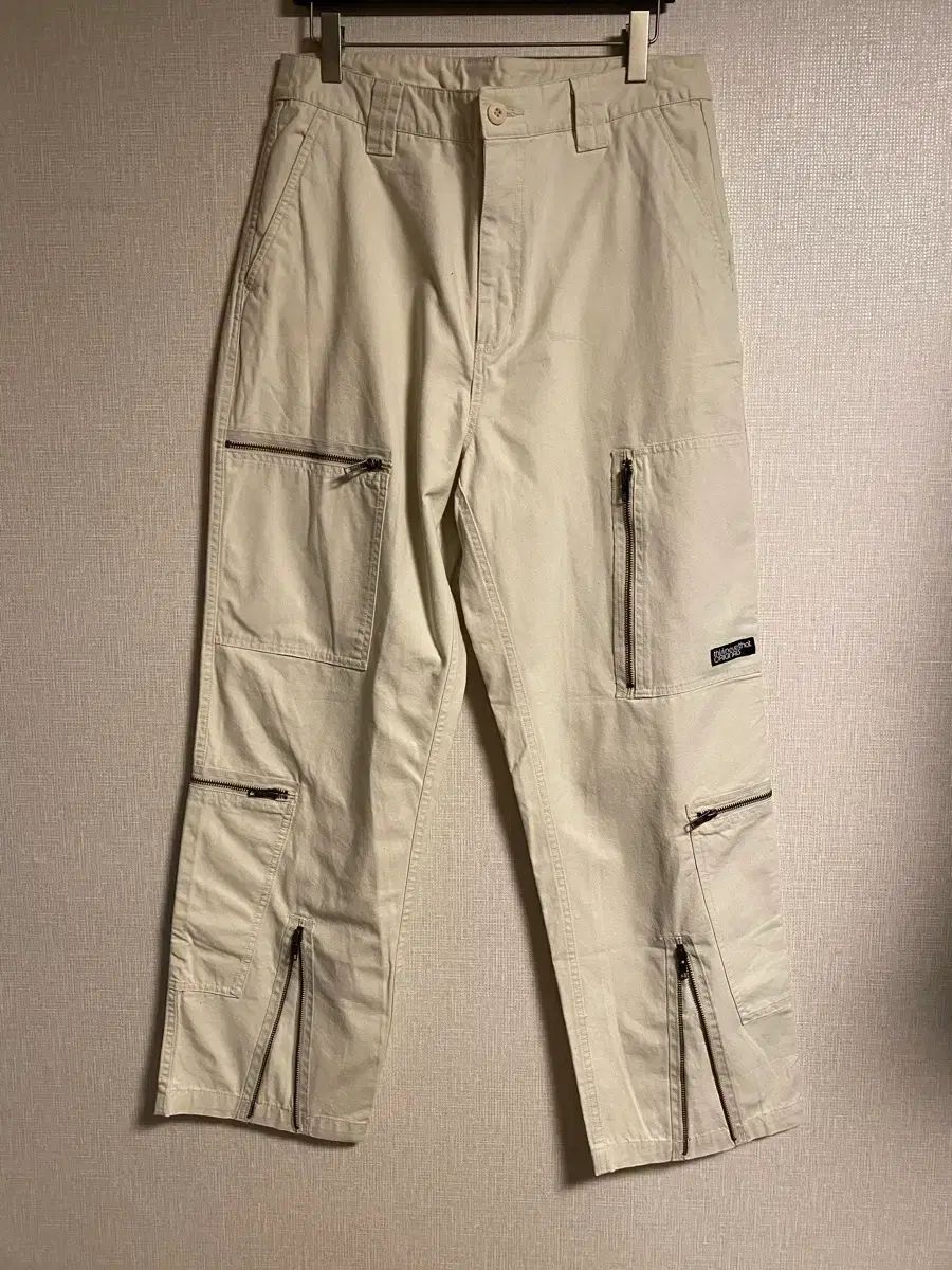 Thisisneverthat サイドジッパーパンツ