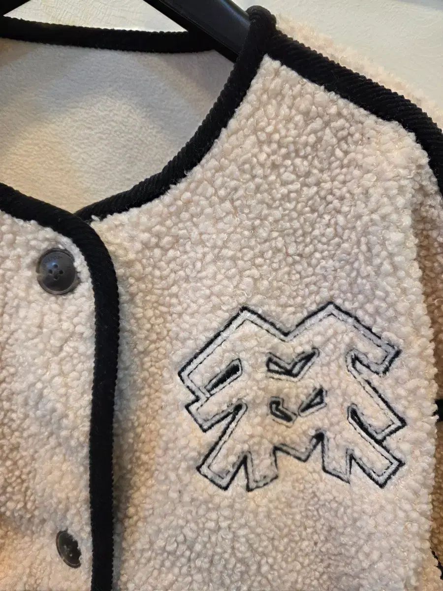 コーロンスポーツ アイボリー ボア ハーフ ジャケット