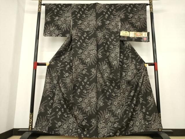 平和屋着物 本場大島紬 泥染め 手織り 緯総絣 草花 証紙付き 正絹 ck