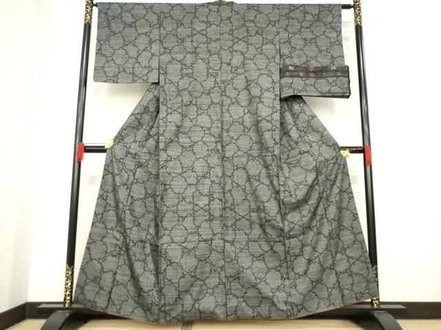 平和屋着物●本場大島紬 カタス9マルキ 雪輪重ね文 反端付き 正絹 ck