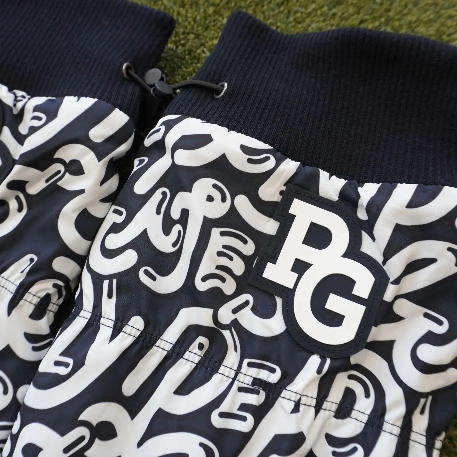 タグ付 PEARLY GATES ぷにぷにロゴ柄レッグウォーマー LADIES