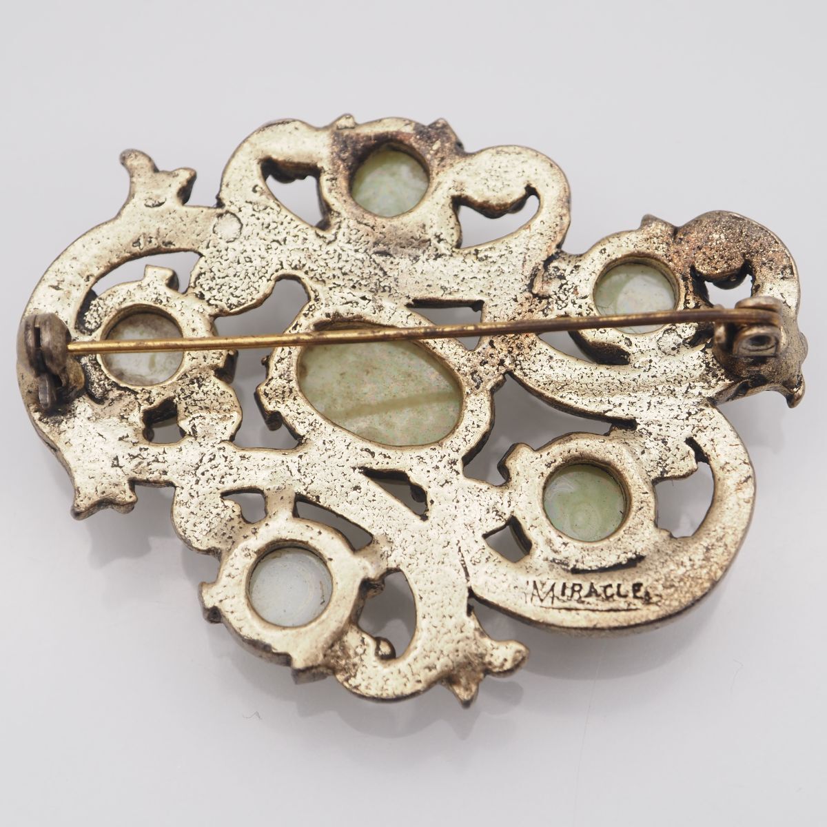 J961 イギリス ヴィンテージ MIRACLE ミラクル ブローチ グリーン