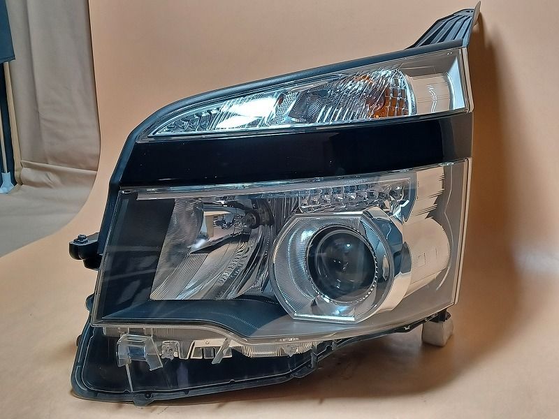 コーティング済 ヴォクシー ZRR75W 左ヘッドランプ・ヘッドライト Z