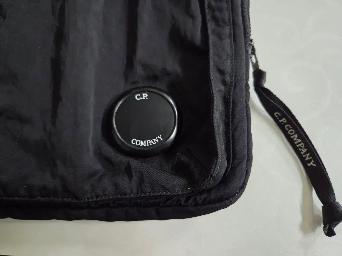 C.P. COMPANY シーピーカンパニー クラッチバッグ モックネック アウター