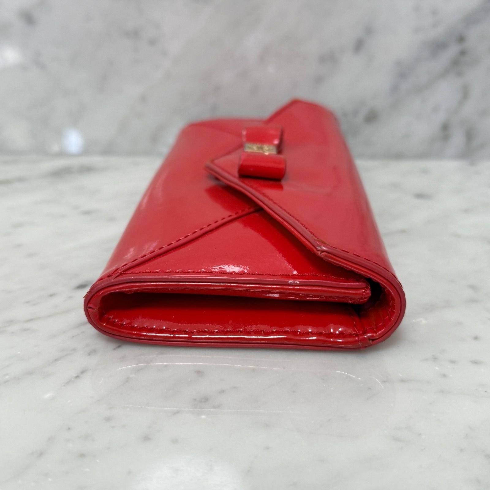 Tory Burch トリーバーチ 長財布 レッド 赤 リボン エナメル - メルカリ