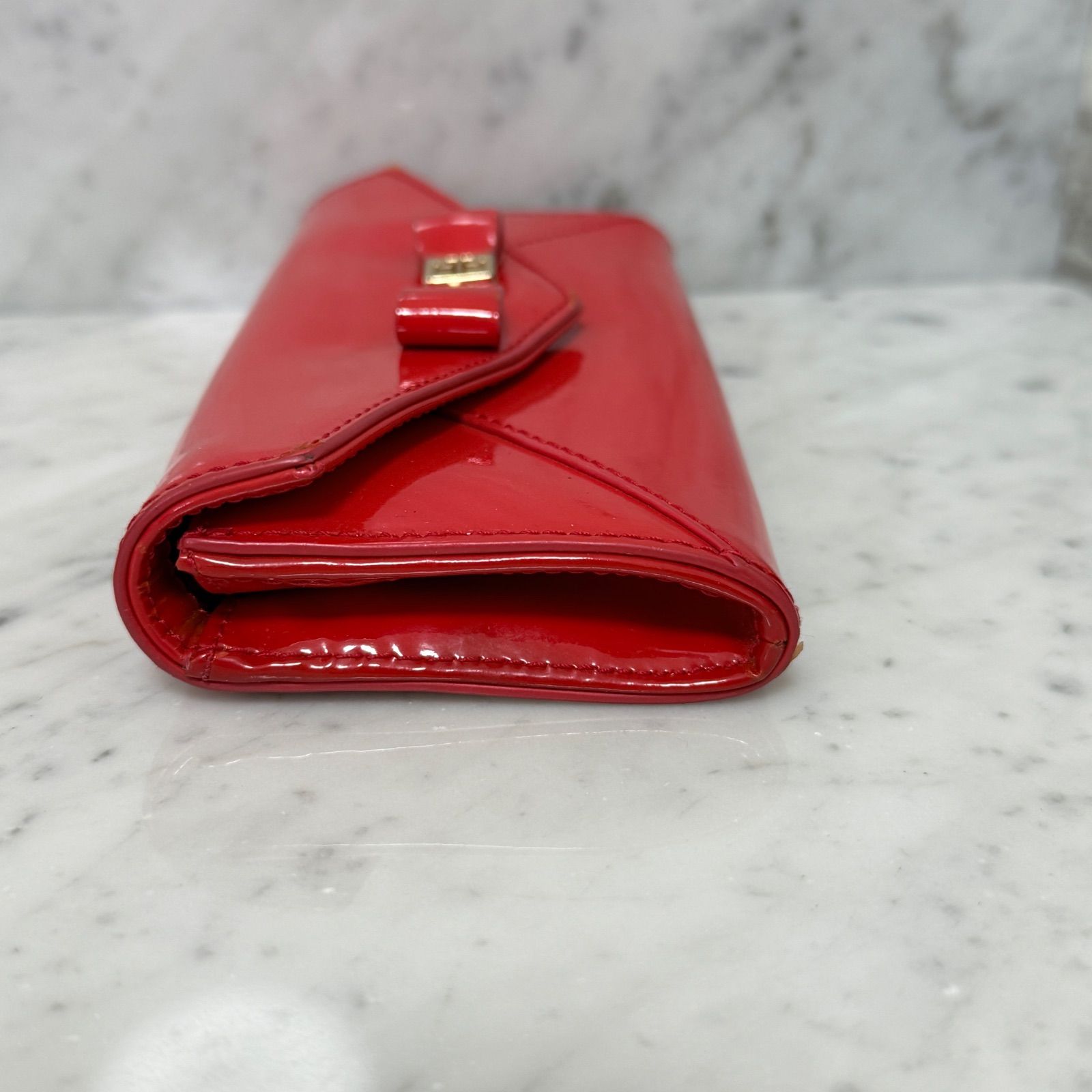 Tory Burch トリーバーチ 長財布 レッド 赤 リボン エナメル - メルカリ