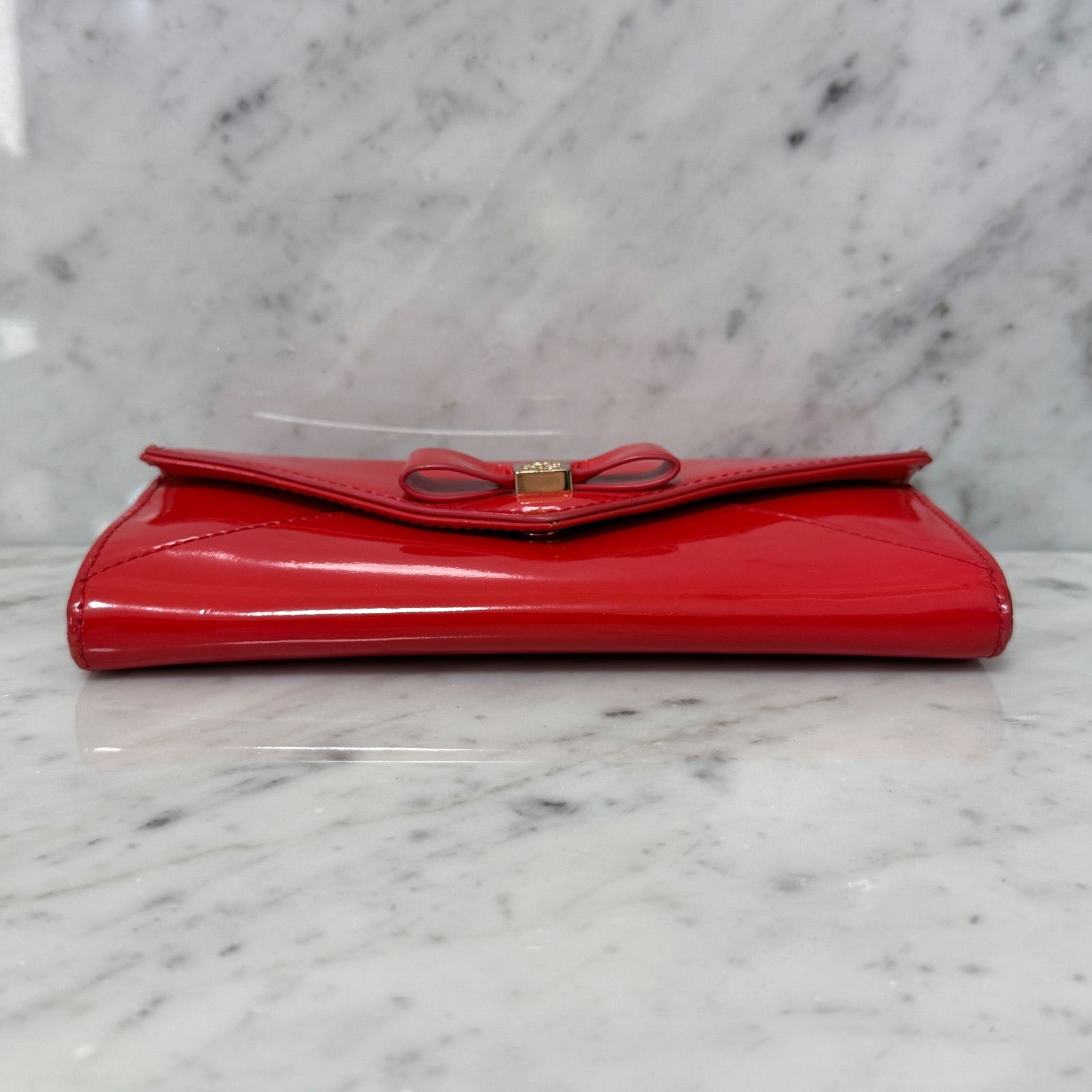 Tory Burch トリーバーチ 長財布 レッド 赤 リボン エナメル - メルカリ