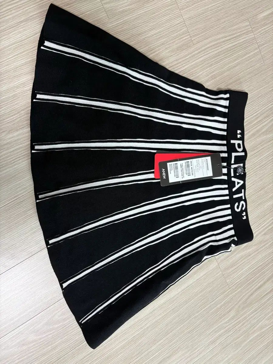 A グース ニット ダウンベスト パンツ キャディバッグ