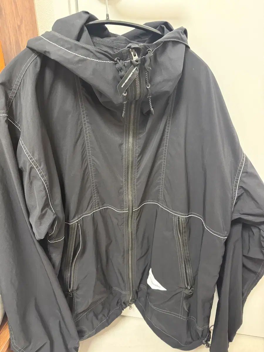 アンドワンダー パーテックス ウィンドブレーカー 100