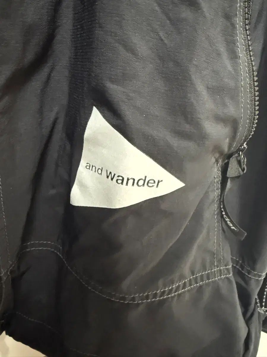 アンドワンダー パーテックス ウィンドブレーカー 100