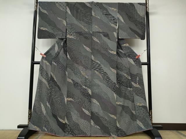 平和屋着物○伝統工芸士 染谷梅治 小紋 道長更紗花文 黒地 さが美扱い