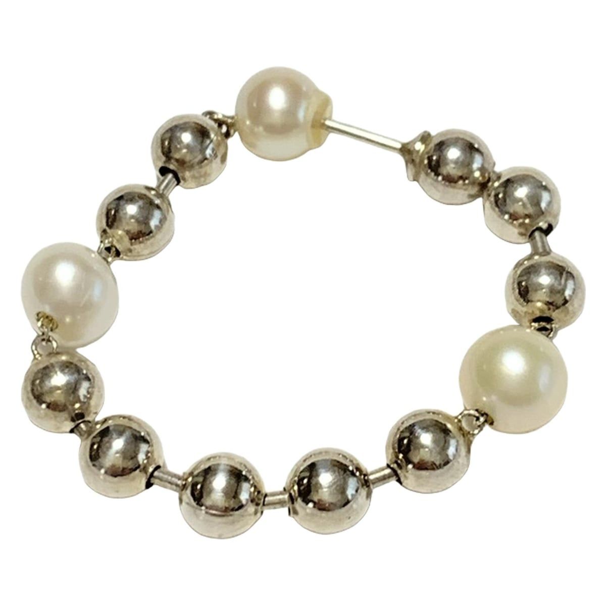 e.m. イーエム ピアス - シルバー×白 片側