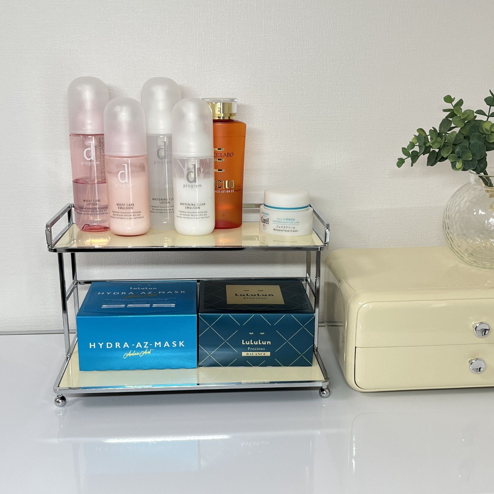 シルバー脚付き2段ディスプレイラック - メルカリ