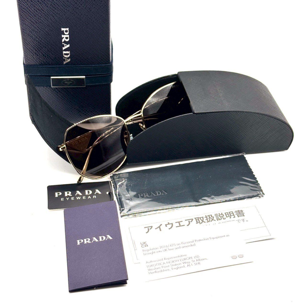 横顔を美しく魅せる】 PRADA プラダ サングラス トライアングルロゴ