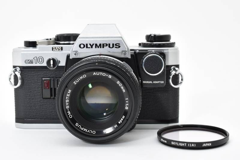 実用品 Olympus オリンパス OM 10 シルバー マニュアルアダプター付 OM-SYSTEM ZUIKO AUTO-S 1.8 50 mm レンズキット フィルム一眼カメラ 3991-19