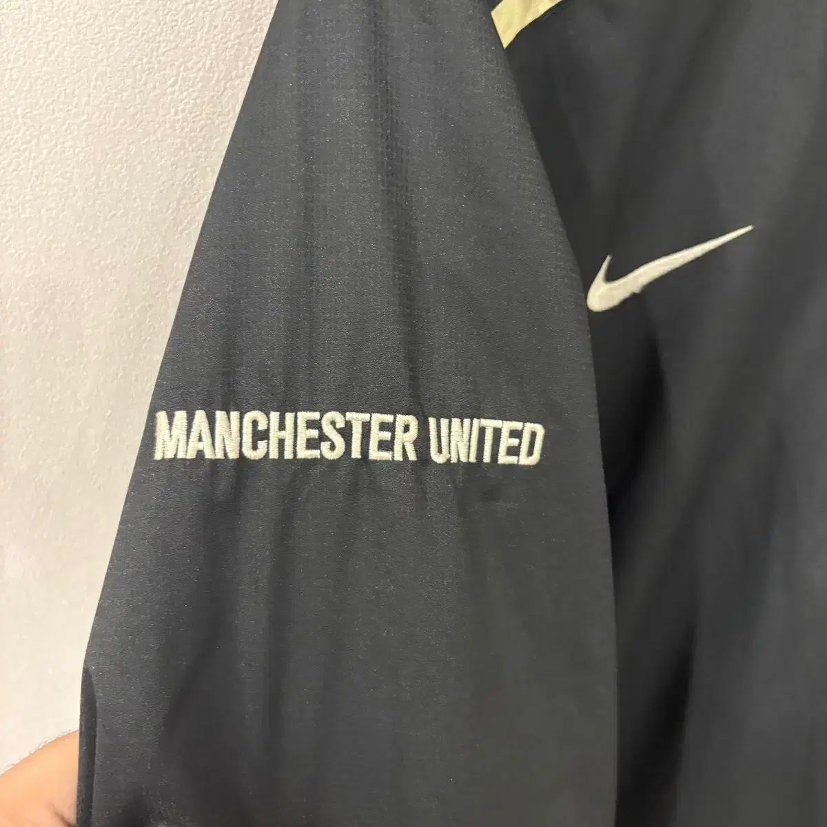 ナイキ マンチェスター ユナイテッド ブラック ウィンドブレーカー 95